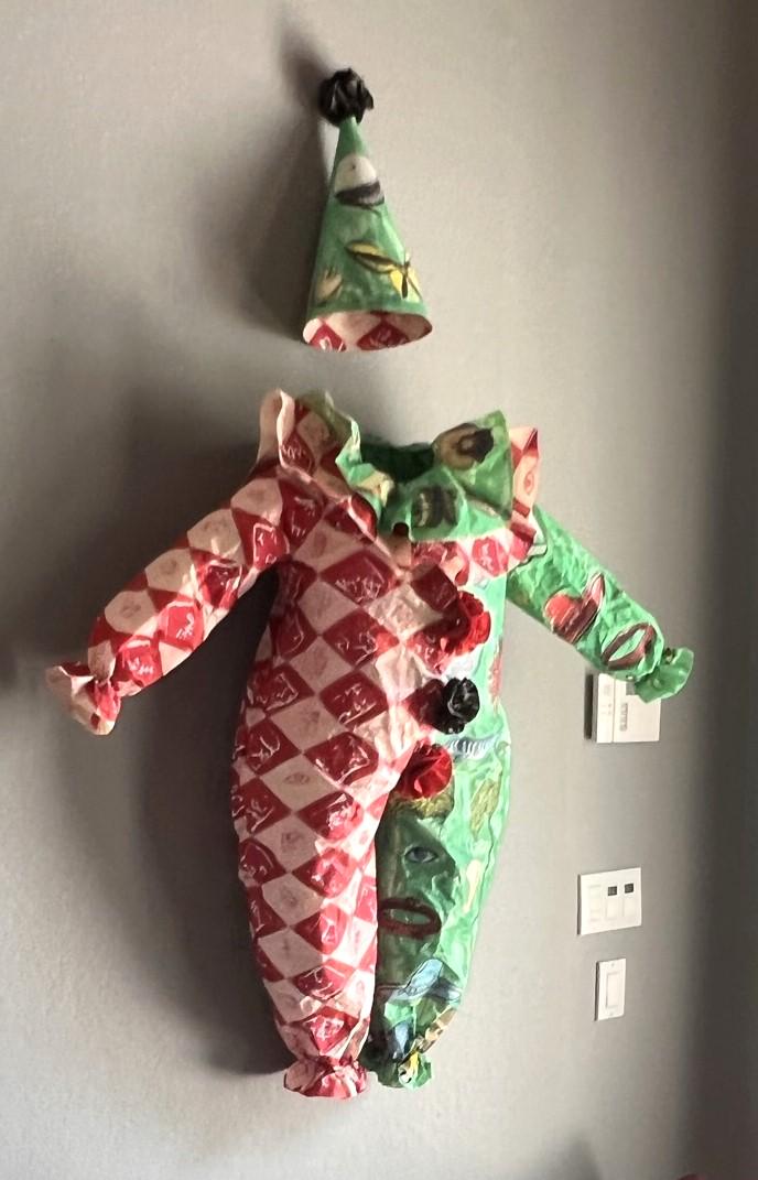 Jane Hammond Clown Suit: Color lithograph with silkscreen collage on handmade Chiri paper in the form of a clown suit by Jane Hammond, American. Features detached conical clown hat with black pompom at its tip. Published by U