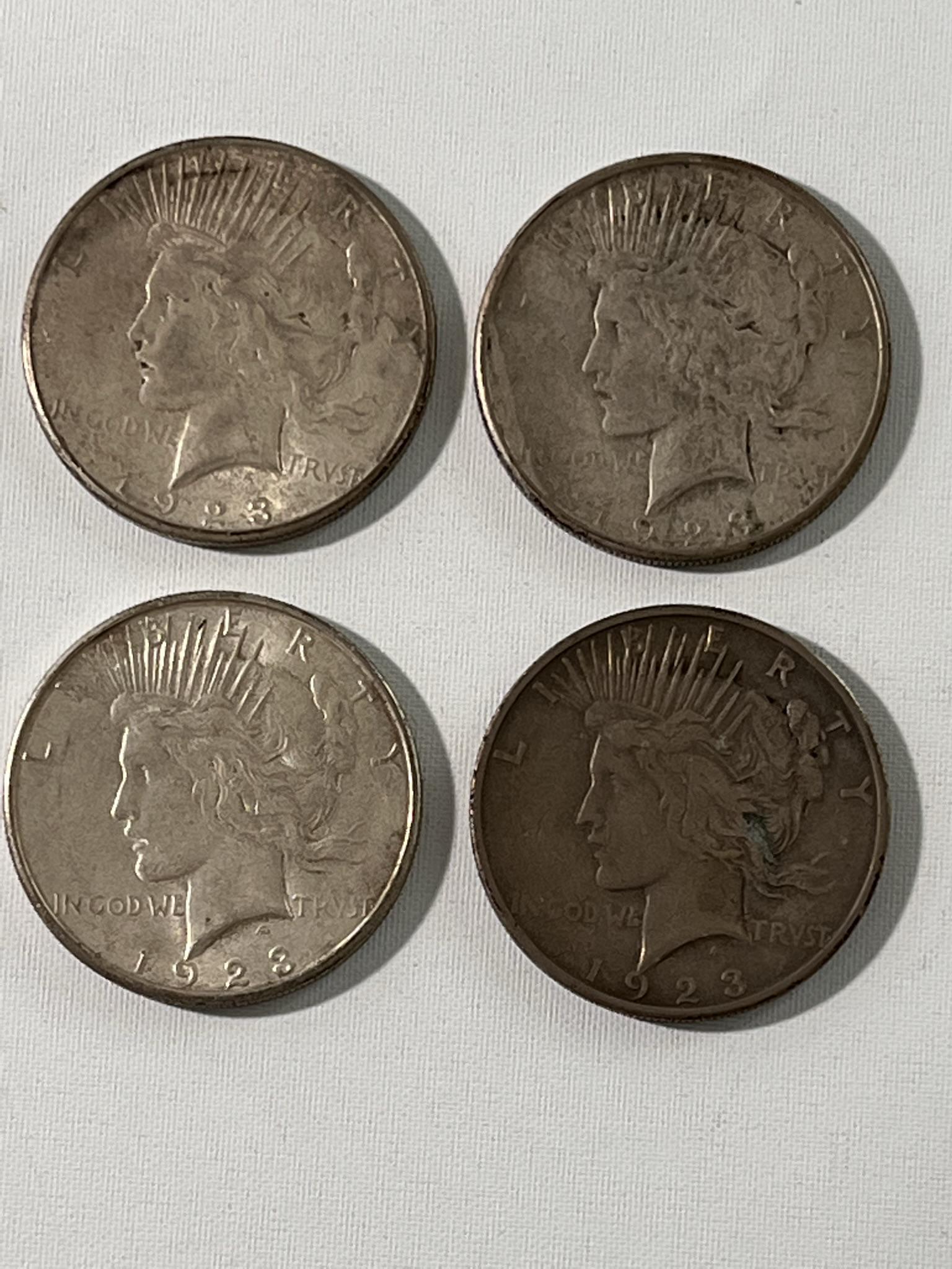 Lot of 4 Peace Silver dollars (1 of 9)