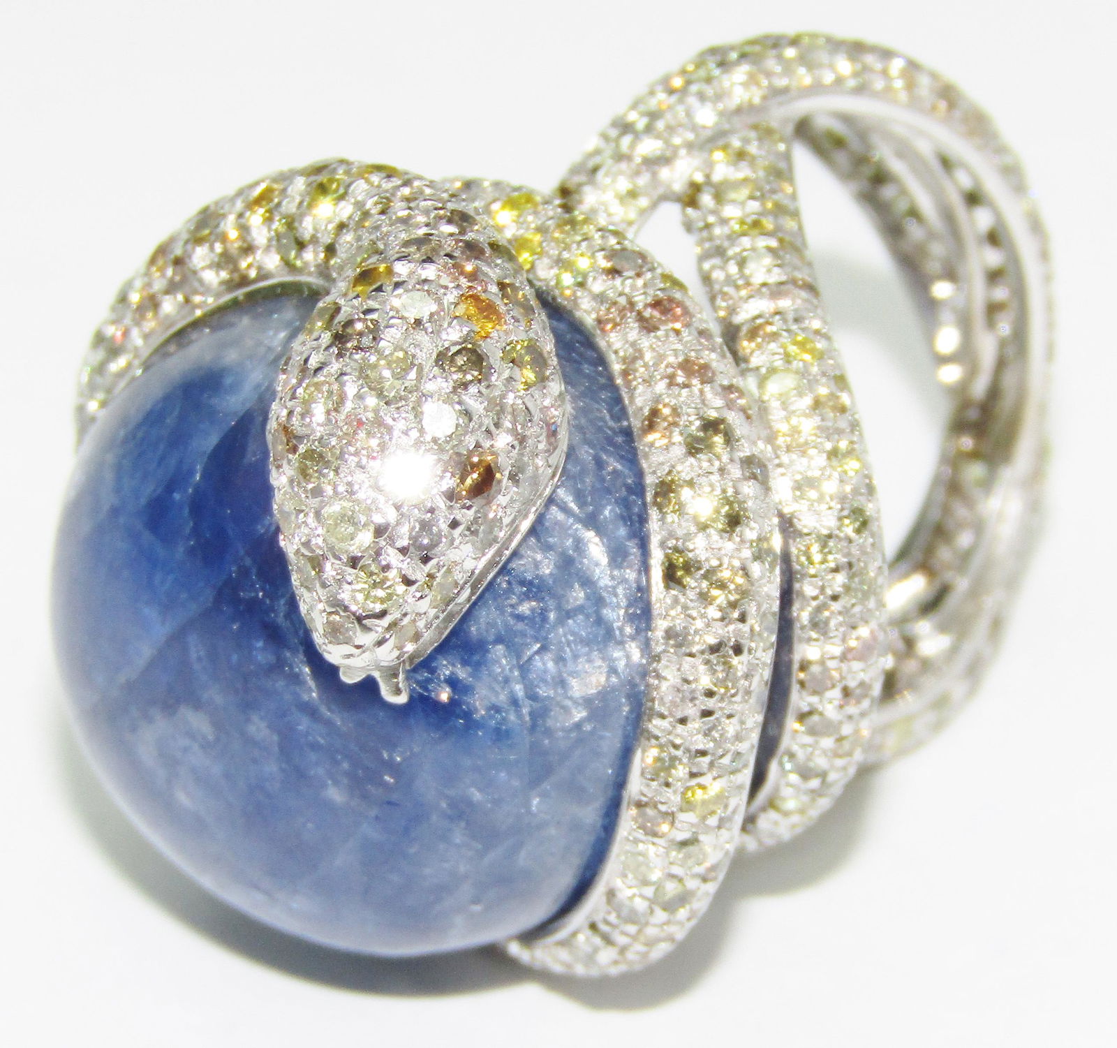 Platinum Snake Ring with Opaque Cabochon Sapphire and Fancy Diamond Melee (1 of 5)