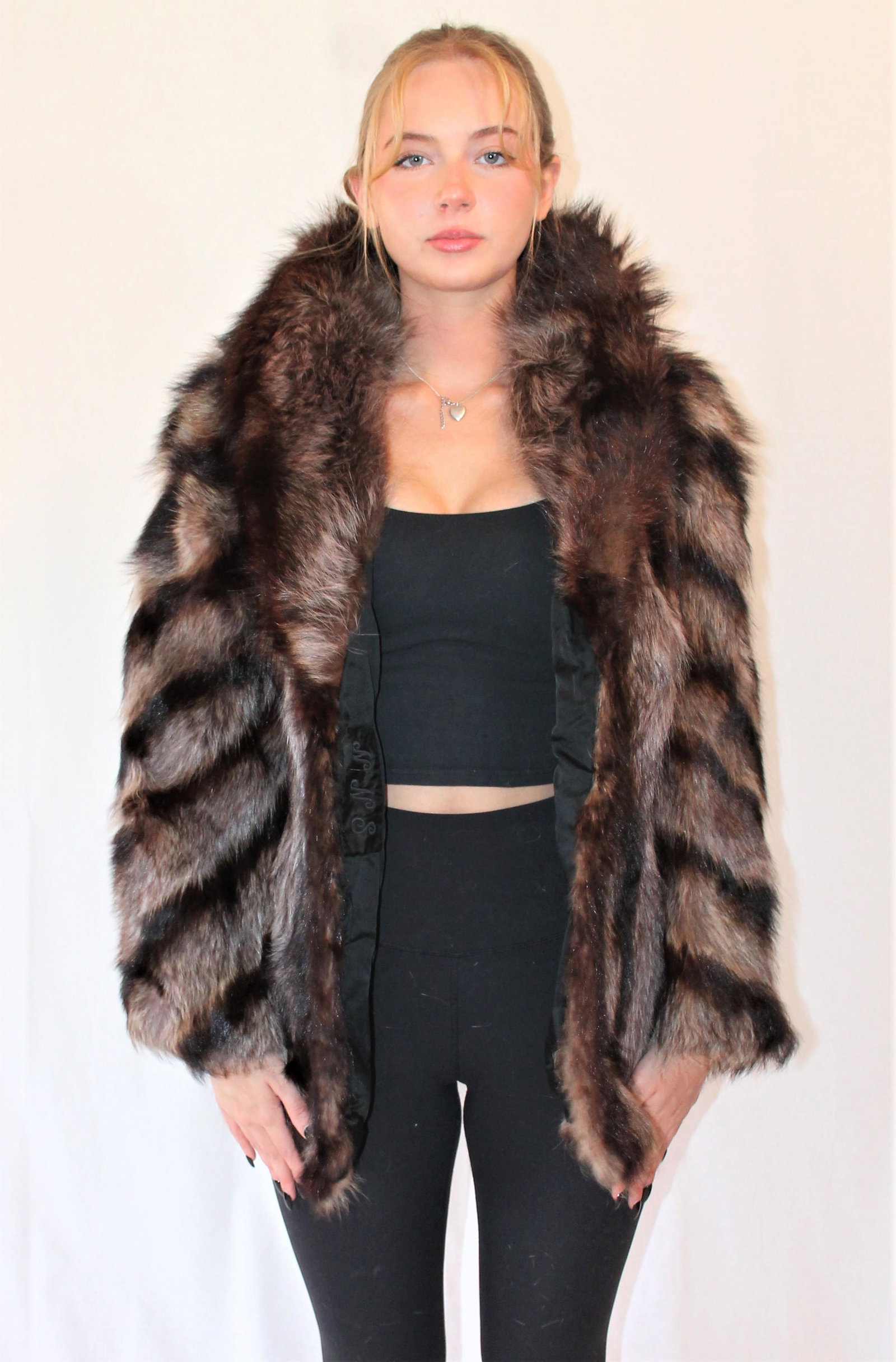 Gayfers Fur Coat: Beautiful brown and black Gayfers fur coat with gorgeous full collar. Shoulder to shoulder measures 19.5", length is 27.5" and sleeves measure 27.5"