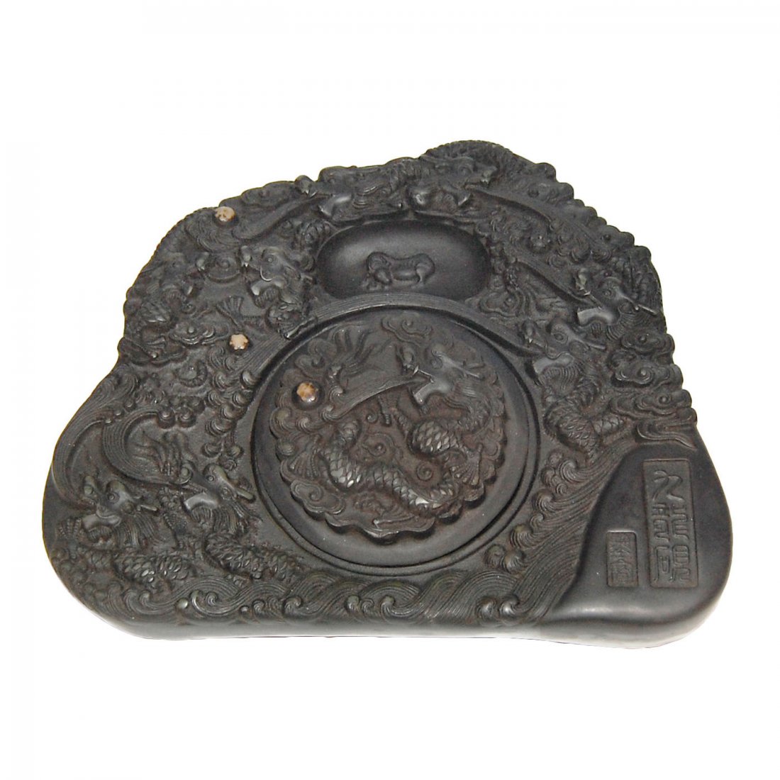 Well Carved Nine-Dragon Swirling Through Wispy Clouds: 浮雕九龙纹意形有盖端砚 Well Carved Nine-Dragon Swirling Through Wispy Clouds Inkstone and a Cover in the Central Ink Well, with Lighte