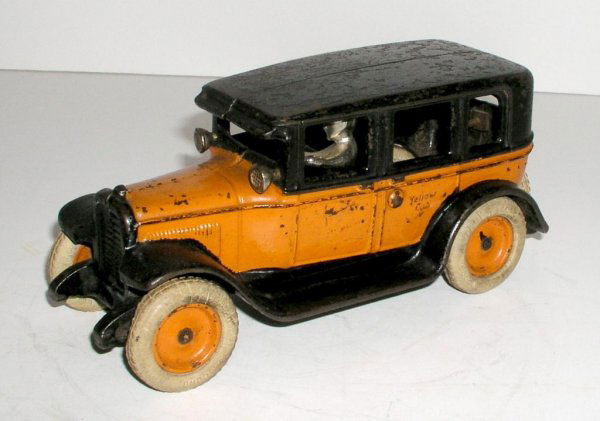 ARCADE 'LIMOUSINE' FLAT TOP CAB: ARCADE 'LIMOUSINE' FLAT TOP CAB circa 1929 - 8 ½" long. Very desirable taxi with rubber tires and spare, nickeled driver and headlights. Provenance: Jack Johnson Collection. Extremely nice example wi