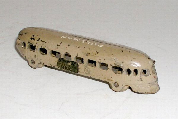 ARCADE 'PRIVATE LABEL' PULLMAN RAILPLANE: ARCADE 'PRIVATE LABEL' PULLMAN RAILPLANE circa 1936 - 5 1/8" long. Lovely rail plane with extremely rare private label, advertising "Sundial Leather Shoes". A very unusual and RARE example finished in