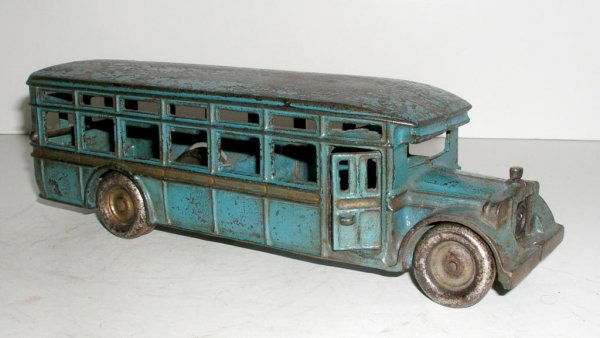 ARCADE ACF COACH: ARCADE ACF COACH circa 1927 - 11 ½" long. RARE bus and the only one produced by Arcade that had an opening door. A particularly high dollar bus with great desirability and scarcity combined. Finished