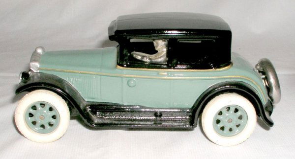 LEWIS BUICK COUPE: LEWIS BUICK COUPE 8 ½" long. This is one of a very limited production of coupes made in the 90's by Don Lewis of California. Original Arcade Buicks were used to establish an exact mold. Finished exac