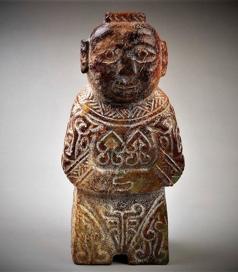 A CHINESE ARCHAIC JADE CARVED FIGURE: SPRING AND AUTUMN PERIOD 770-467 B.C. A CHINESE ARCHAIC JADE CARVED FIGURE H: 3.5 in (8.8 cm) Provenance: Property from a private Taiwan collector, purchased in 1930 from Hong Kong (春秋&#