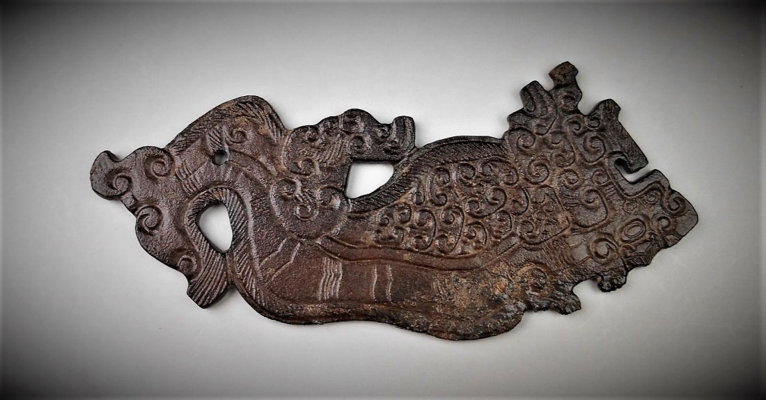 A CHINESE ARCHAIC JADE DRAGON PENDANT: WARRING STATES PERIOD 770-221 B.C. A CHINESE ARCHAIC JADE DRAGON PENDANT 5 inx2 in (12.7x5.1cm) Provenance: Property from a private Taiwan collector, purchased in 1930 from Hong Kong戰國&#