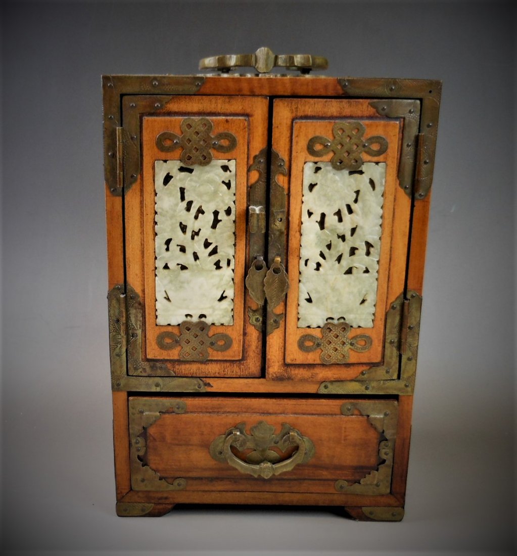 A CHINESE WOOD AND JADE BOX: A CHINESE WOOD AND JADE BOX, loss of one small door lock handle 9.75 inx5 in (24.7x12.7 cm)
