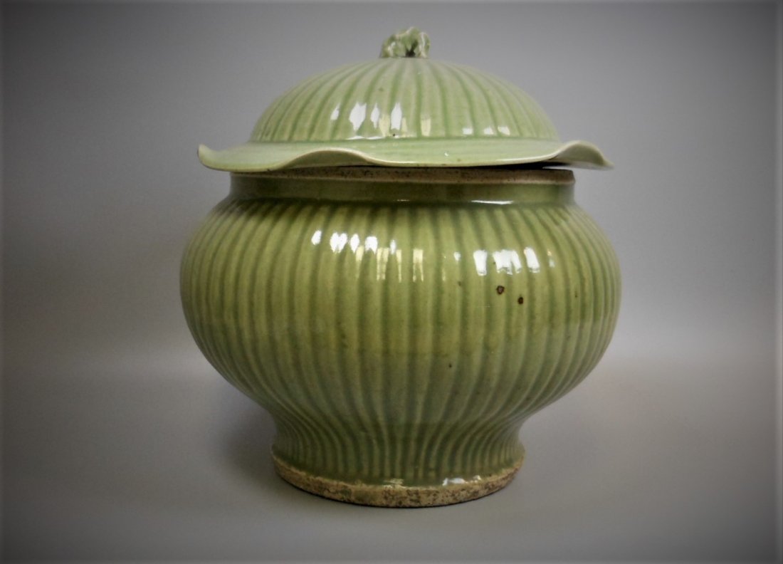 A CHINESE YUAN DYNASTYLONGQUAN-YAO CELADON JAR AND LID (1 of 5)