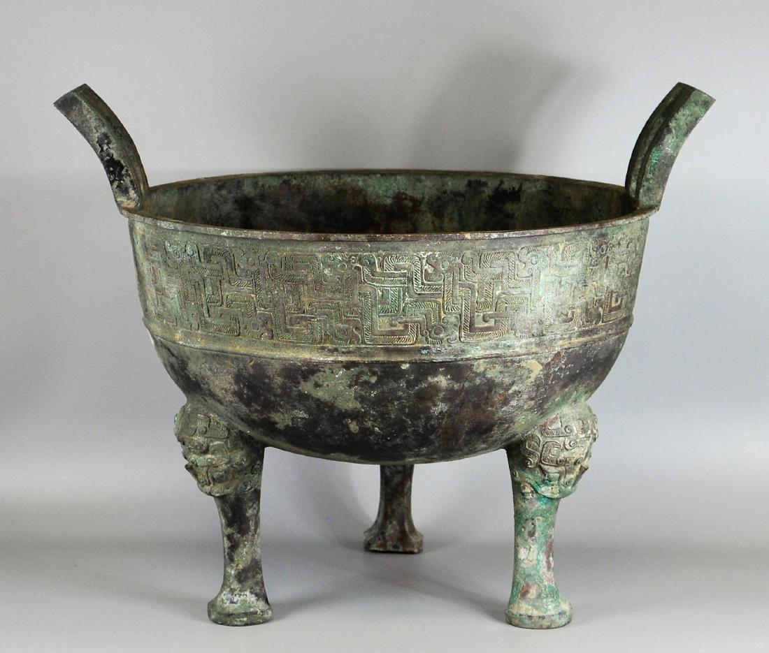 A large Chinese archaic bronze vessel, ding (1 of 10)