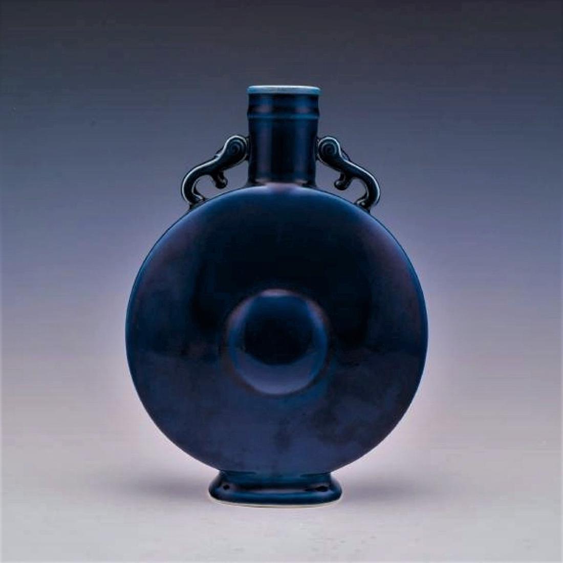 A Chinese blue glazed porcelain cobalt moon flask (1 of 8)