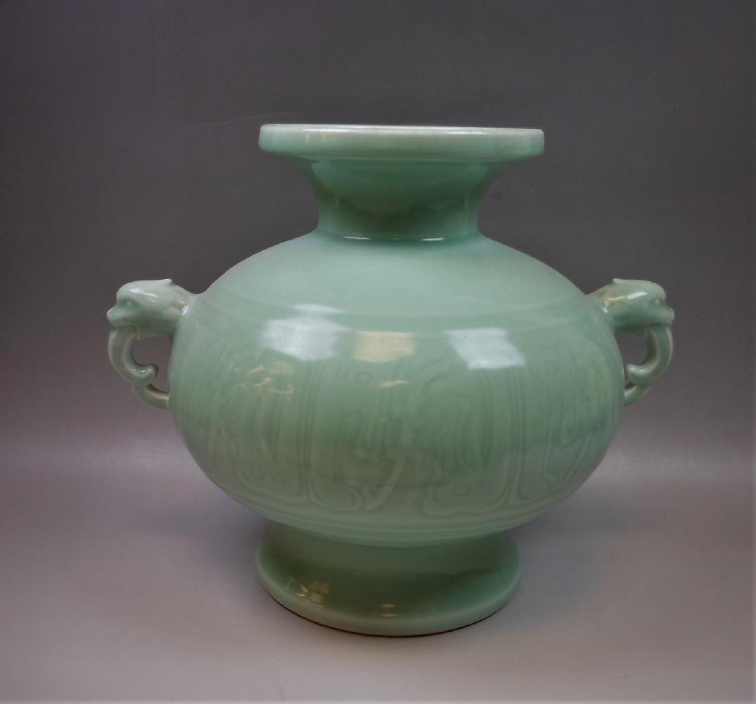 A Chinese Qing style celadon porcelain vase (1 of 9)