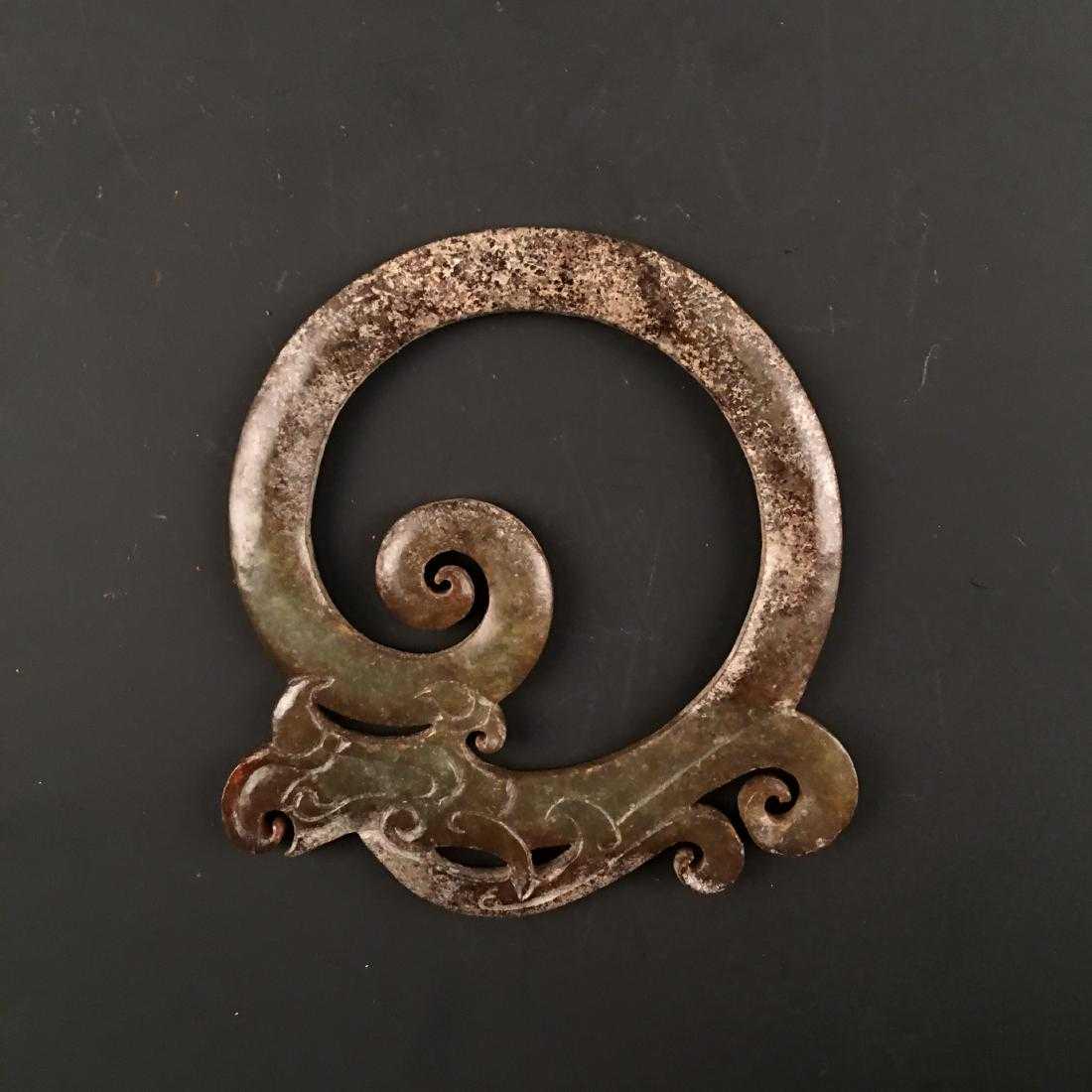 A Chinese archaic jade carved dragon (1 of 5)