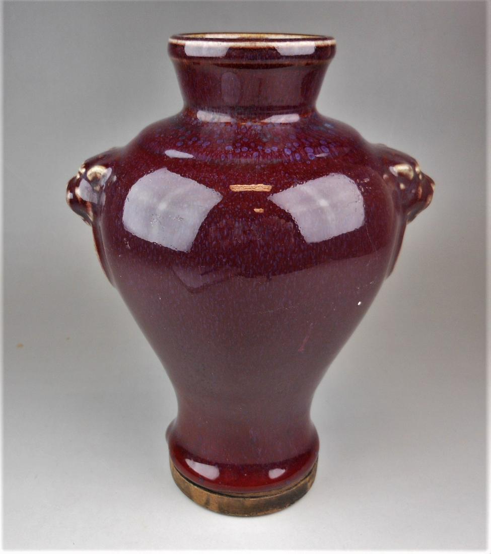 A Chinese archaic style red glazed porcelain vase (1 of 6)