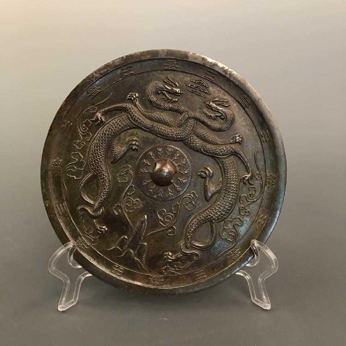 A Chinese archaic  style  bronze mirror (1 of 7)