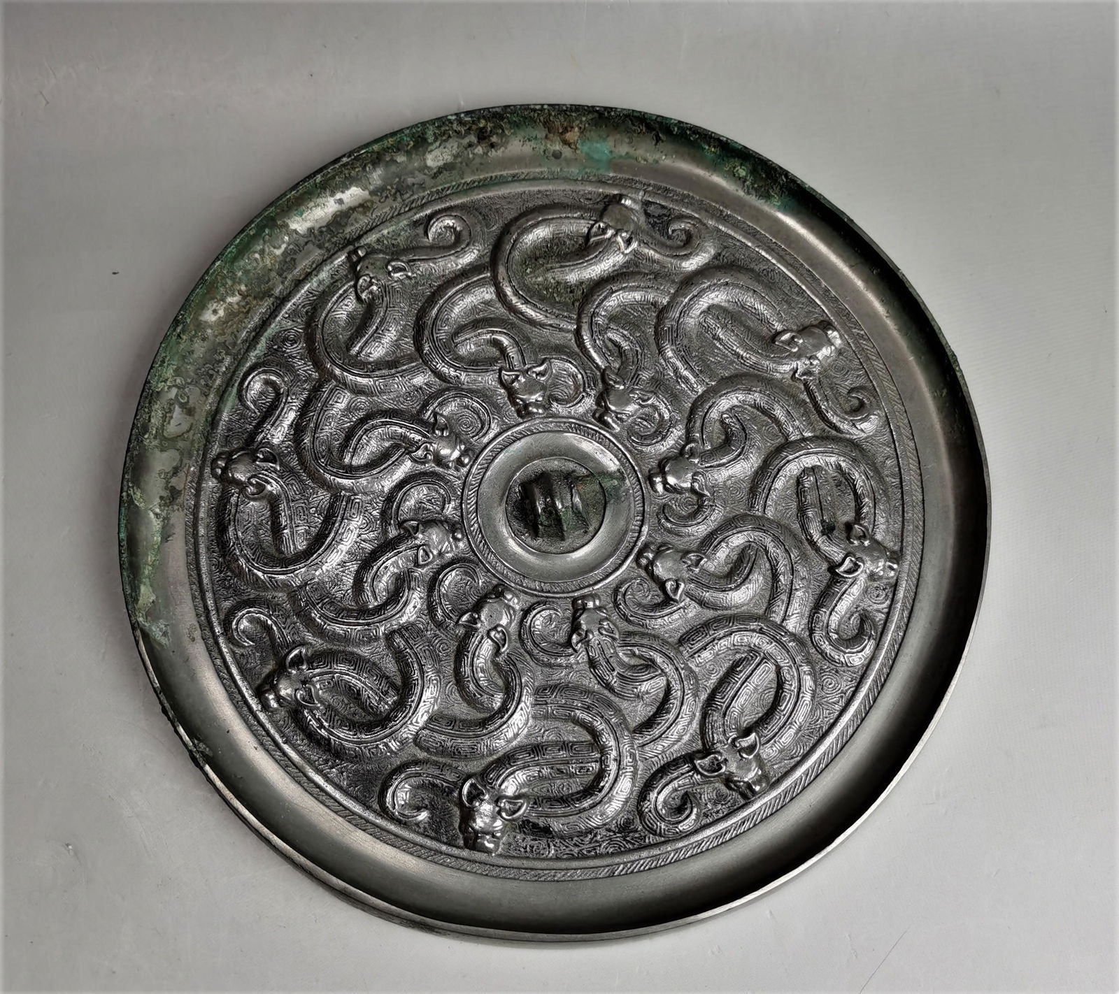 A Chinese archaic  style  bronze mirror (1 of 7)