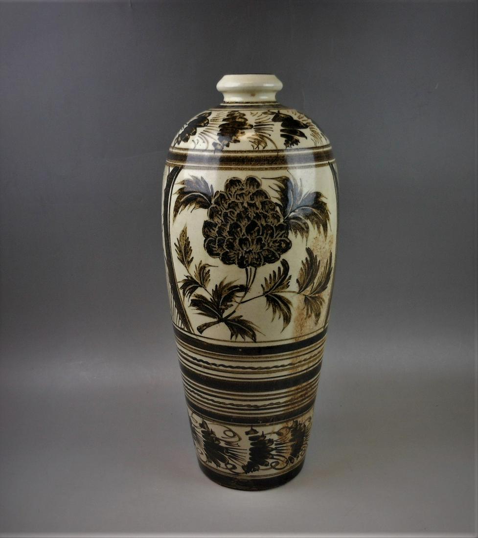 A Chinese Song style Cizhou-yao carved flower porcelain (1 of 8)