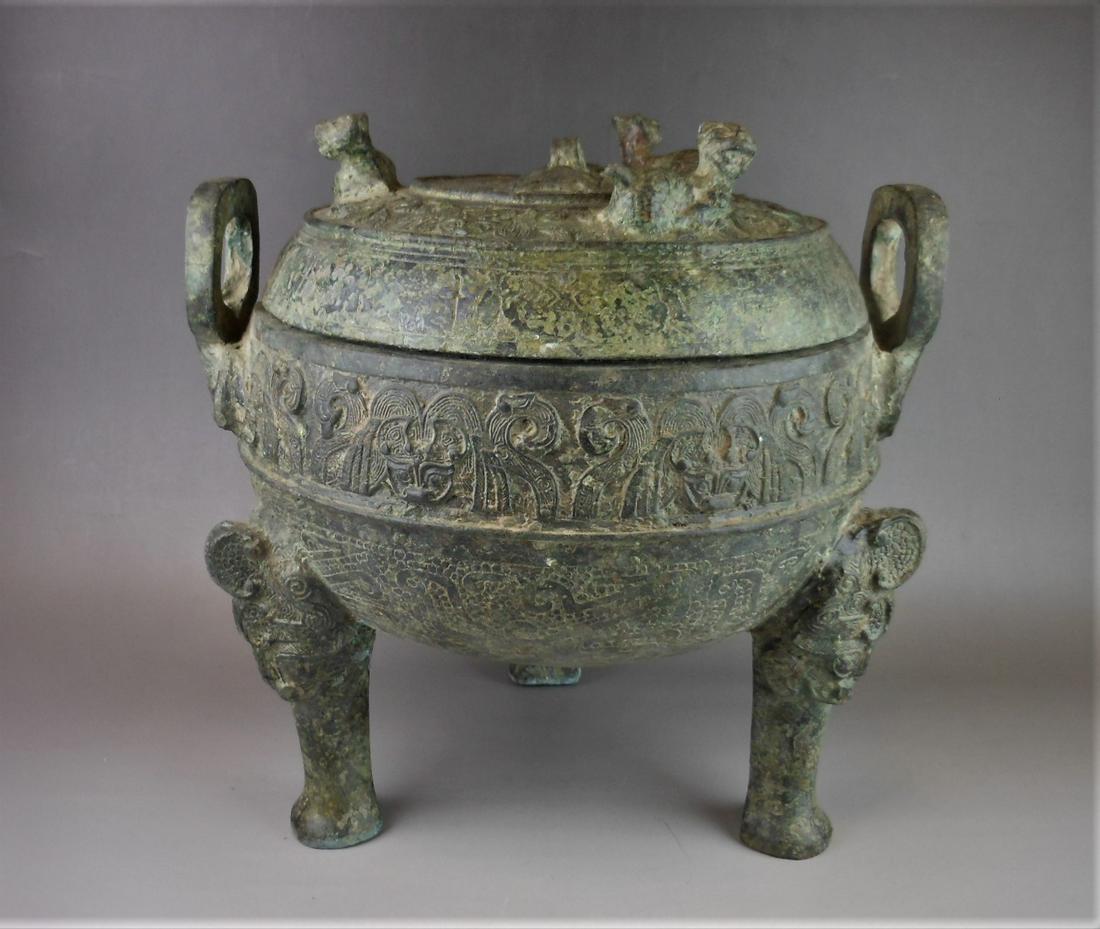 A Chinese Western Zhou period style bronze Ding and lid: A Chinese Western Zhou period style bronze ding and lid, 24x24cm. Provenance: From Avenrura, Miami, FL private collector. Shipping: We are able to pack and ship this item to an address in the United S