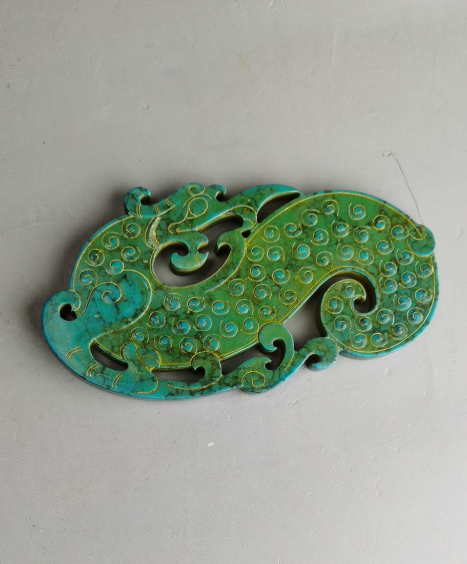 A Chinese archaic style turquoise carved dragon-formed (1 of 6)