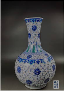 Chinese blue and white and famille rose porcelain vase: Chinese blue and white and famille rose porcelain vase H: 39.5cm, W: 24cm Packing and Shipping – You can choose our own shipping department or LiveShipping. If you would like to using our own shippi