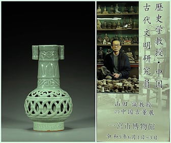 Chinese celadon glazed double eared carved porcelain vase