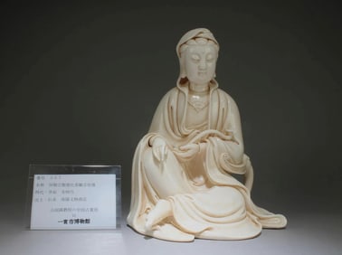 Chinese white glazed seated porcelain Guanyin statue