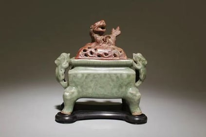 Chinese longquan ware celadon four-legged censer with lid