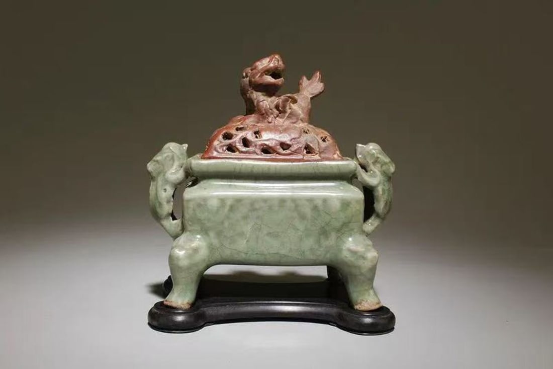 Chinese longquan ware celadon four-legged censer with lid: U. S. Poly International Auction Gallery is an independent company registered in the United States. It has no affiliation with Beijing Poly International Auction or Poly Auction Hong Kong.AI detection