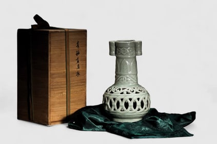 Chinese celadon glazed double eared carved porcelain vase