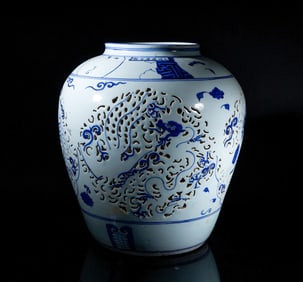 Large Chinese blue and white carved dragon and qiling motif porcelain vase