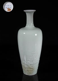 Chinese celadon glazed porcelain vase with carved dragon motif