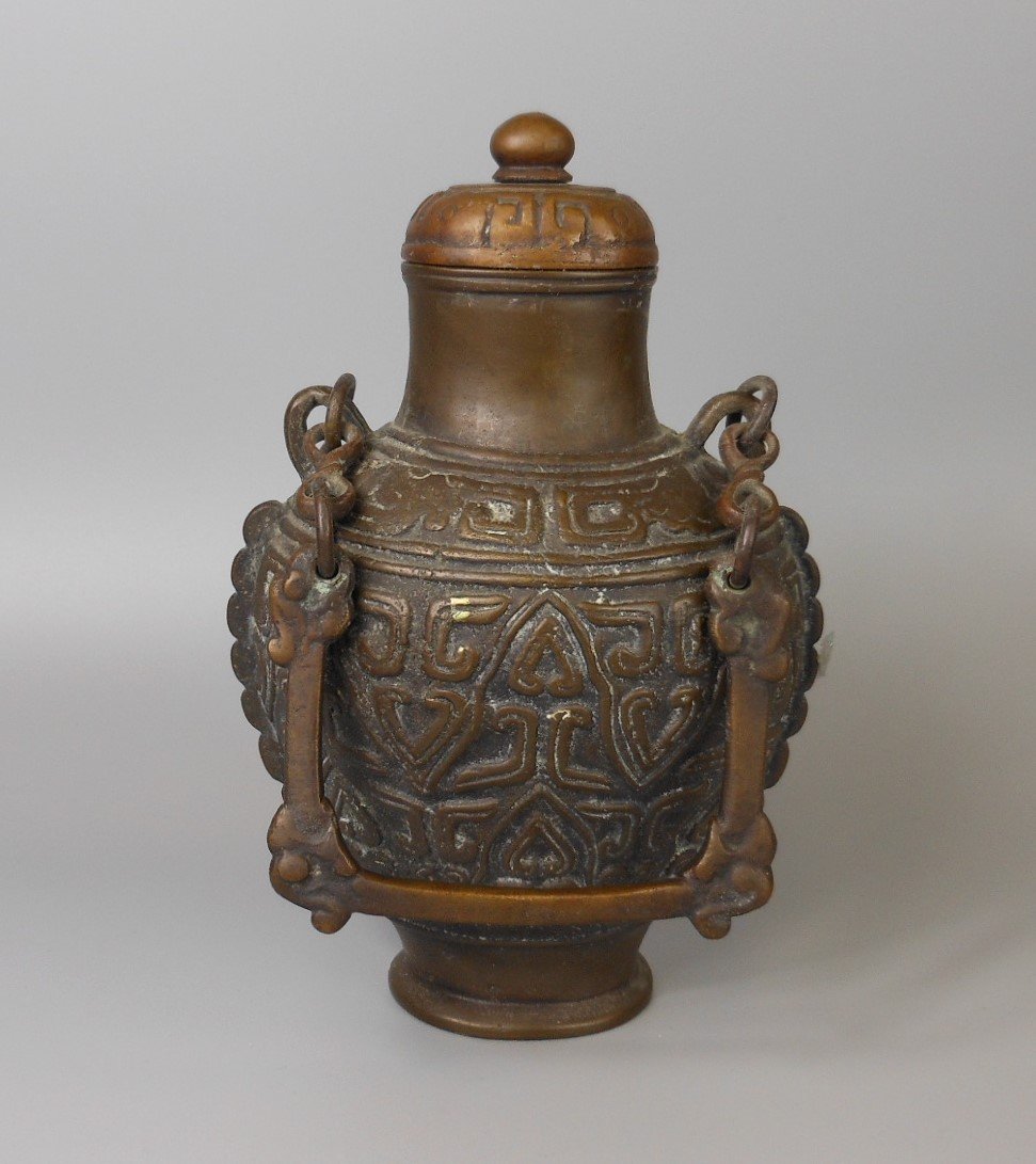 A Chinese antique bronze teapot: A Chinese antique bronze teapot, 18cm H