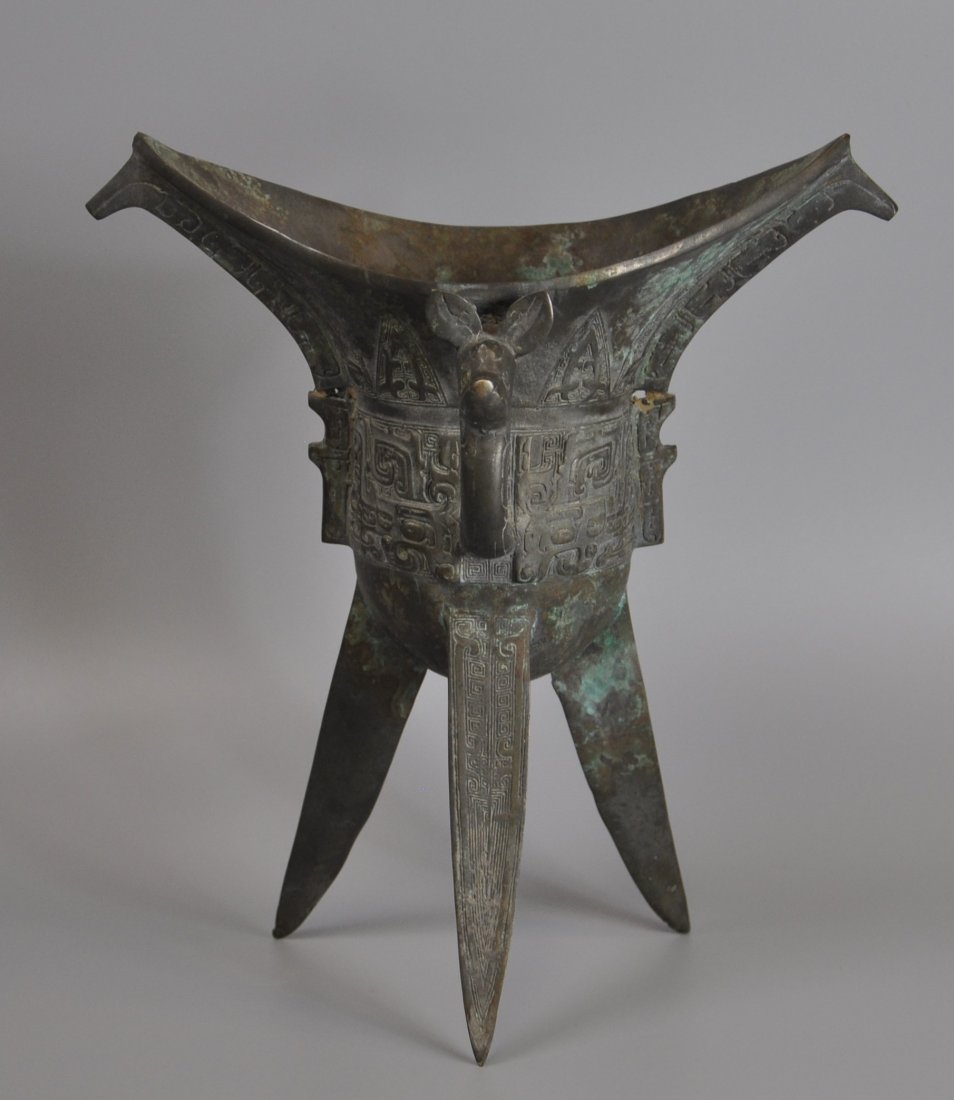 A Chinese antique zhou-dynasty Bronze jue: A Chinese antique zhou-dynasty Bronze jue, 24.1x23cm