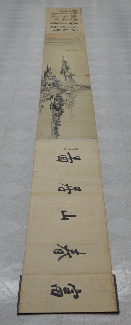 A Chinese antique color painting paper scroll: A Chinese antique color painting paper scroll depicting landscape, 437x32cm. (清仿富春山居图绢本长卷）