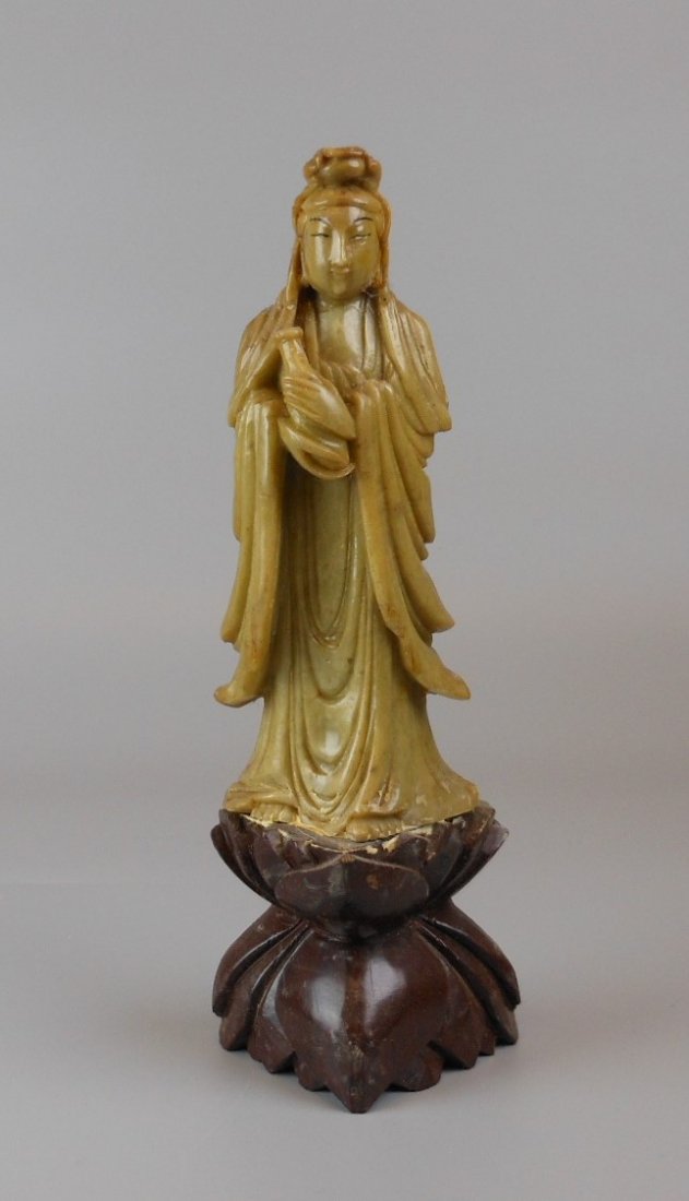 A Chinese soapstone carved Guanyin: A Chinese soapstone carved Guanyin, 18cm H