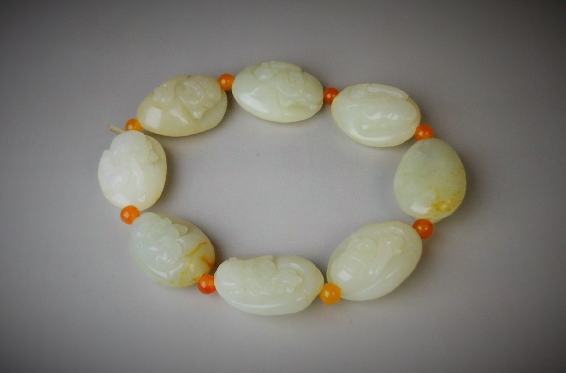 A Chinese hetian white jade bracelet 8 beads (1 of 4)