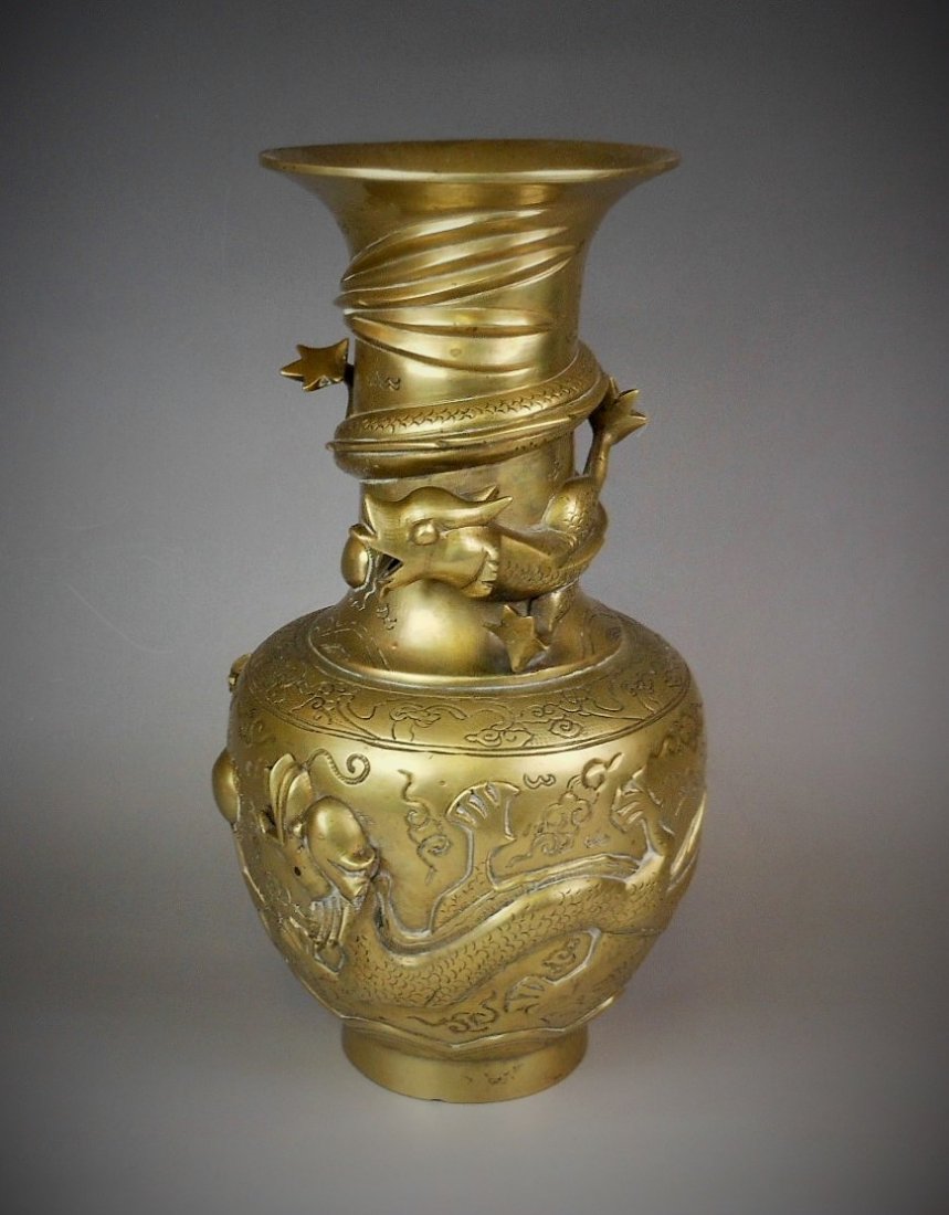 A Chinese antique bronze vase carved with dragon: A Chinese antique bronze vase carved with dragon, 25.5cm H