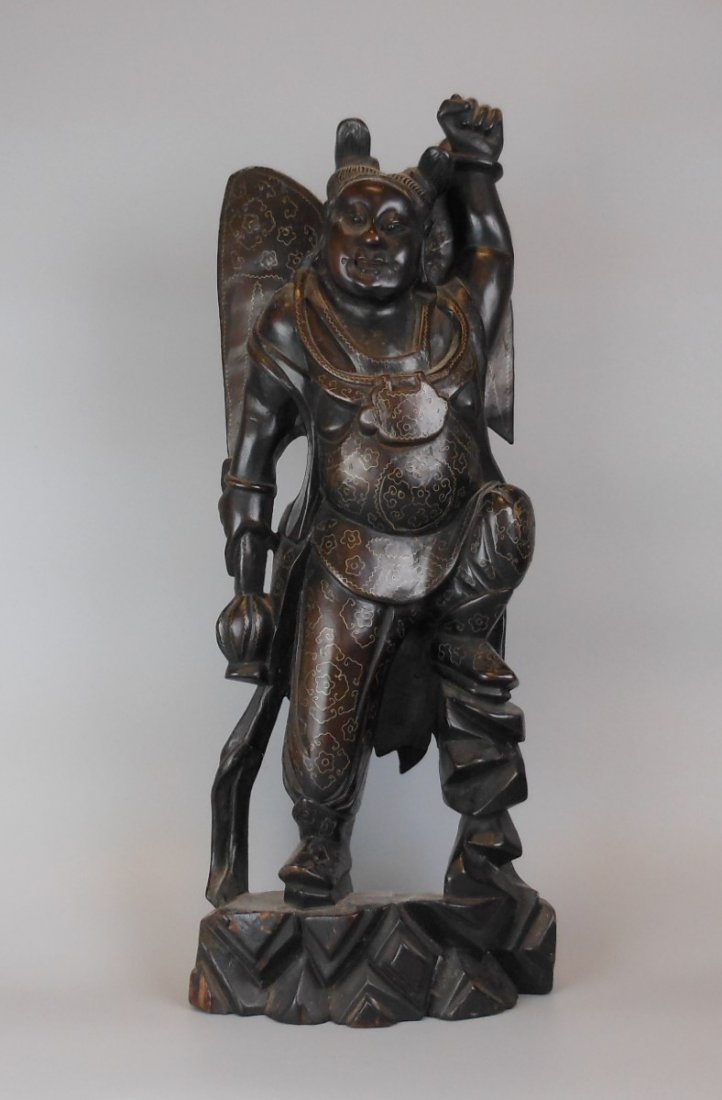 A Chinese antique zitan wood figure: A Chinese antique zitan woodfigure, carving with silverInlays, 38.5cm H