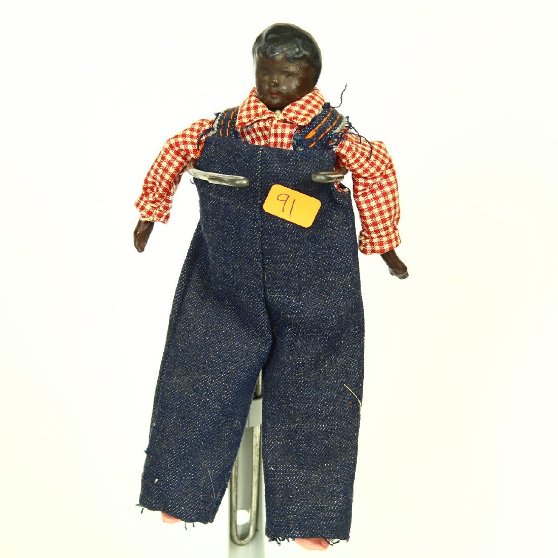 Antique Nippon China Doll Black Boy in Overalls: 8” tall, marked “patented (illegible word) nippon”
