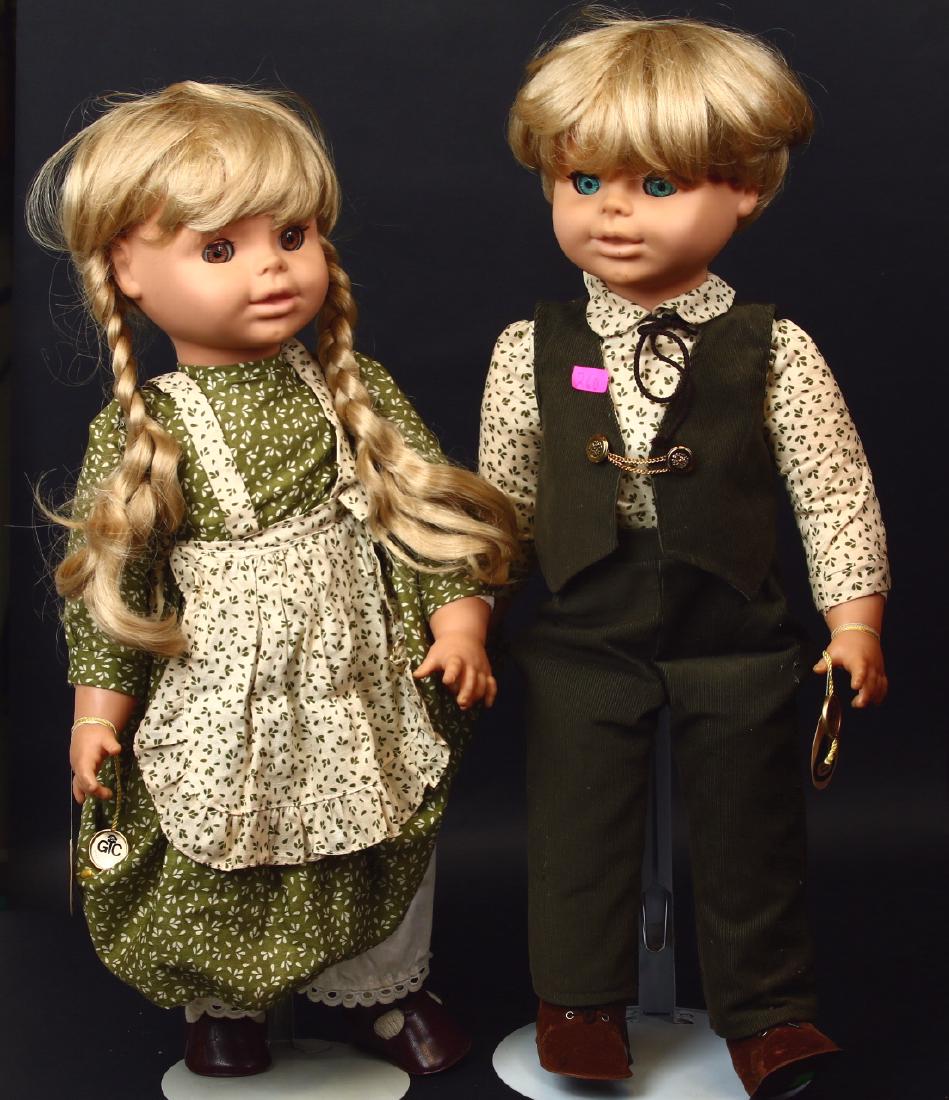 1982 German Blond Boy & Girl Twins by Gustel Wied West: Both dolls Signed and Marked with tags and name plates of Gustel Wied West Germany and hand signed by Eva Maria Reick 1982 both the boy and girl stand 24 inches tall made of vinyl