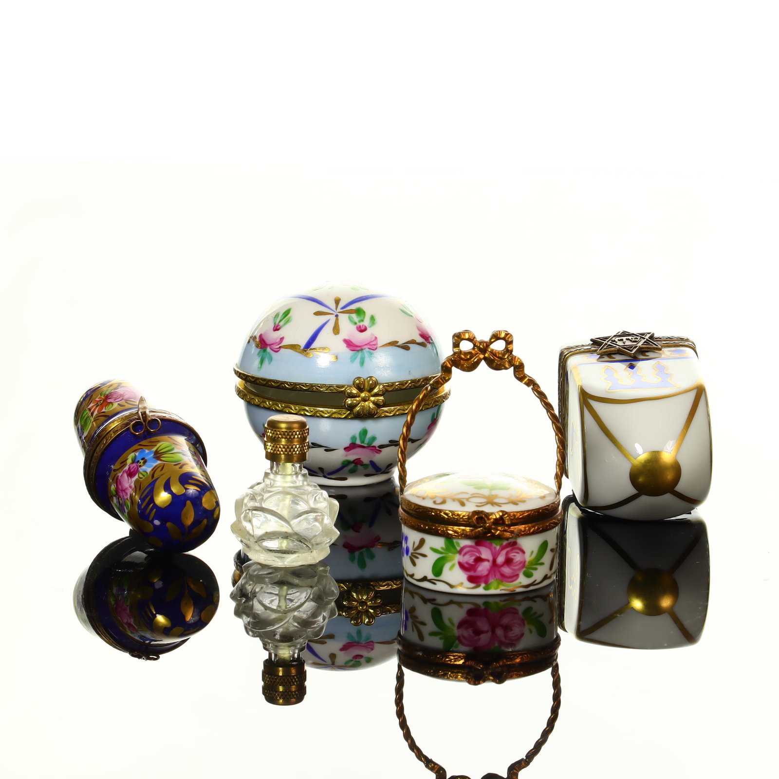 Lot of Limoges Pill Boxes and Mini Perfume Bottle: 4 Limoges and one China Pill Bottle and a mini perfume bottle