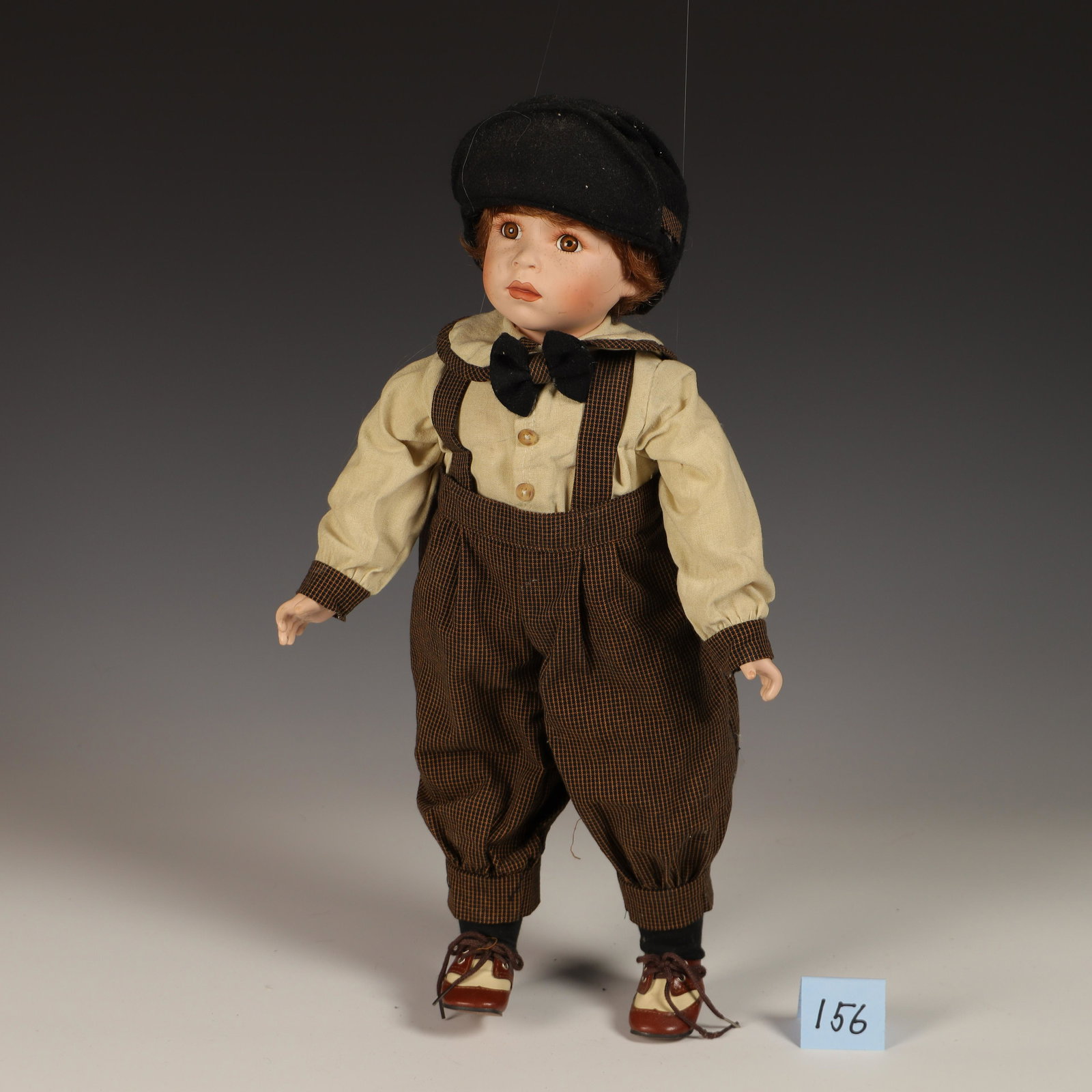 Porcelain Danny Boy Doll Coca Cola FHD: Franklin Heirloom Dolls Fine detail porcelain boy 19 in tall with glass eyes signed 1997 Coca Cola Authorized doll detailed hat and shoes