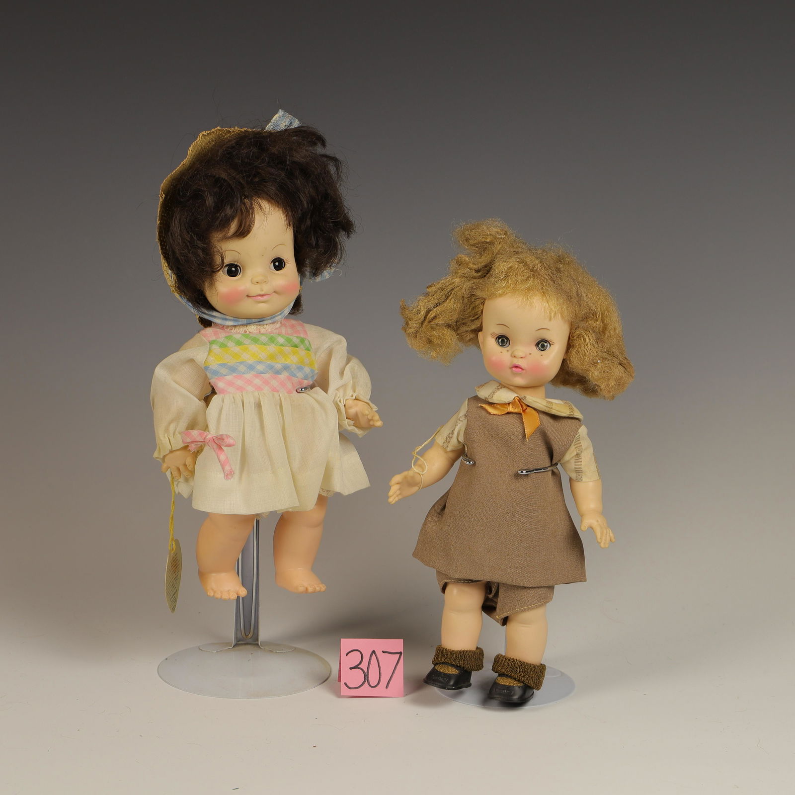 Lot of Two 1966 Effanbee Dolls: Vinyl heads and torso 11 in tall Effanbee Half Pint 11 in tall