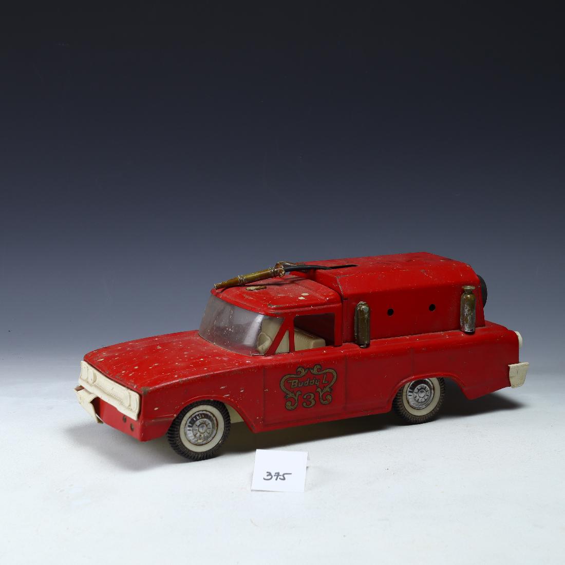 Vintage red Buddy L Fire Truck: Vintage red Buddy L Fire Truck length 14 inches, 5.5 inches wide