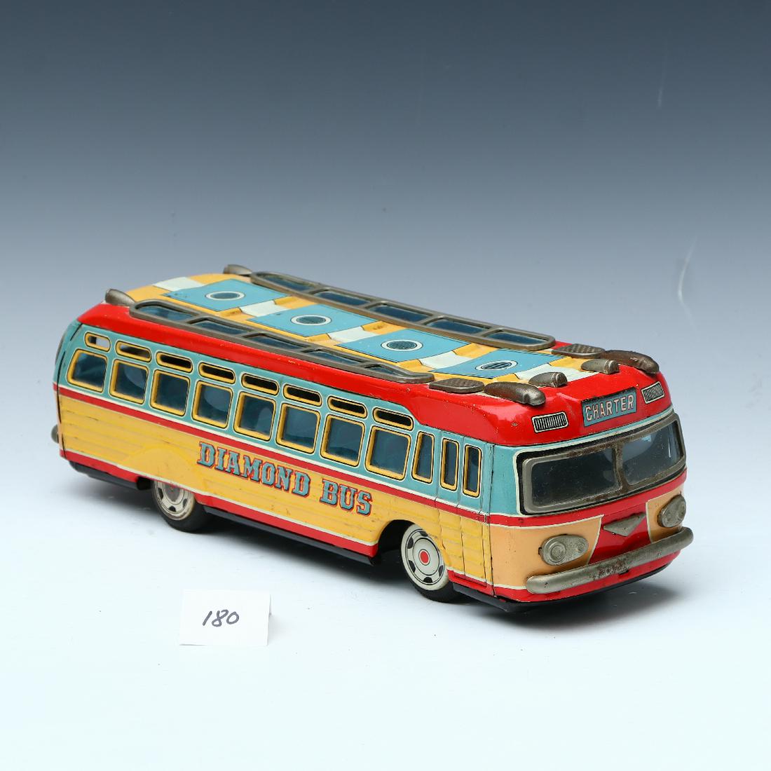 Vintage Tin Diamond Bus Friction Grip made in Japan: Vintage Tin Diamond Bus Friction Grip made in Japan, length 14 inches, 4.5 inches wide, 4.5 inches tall
