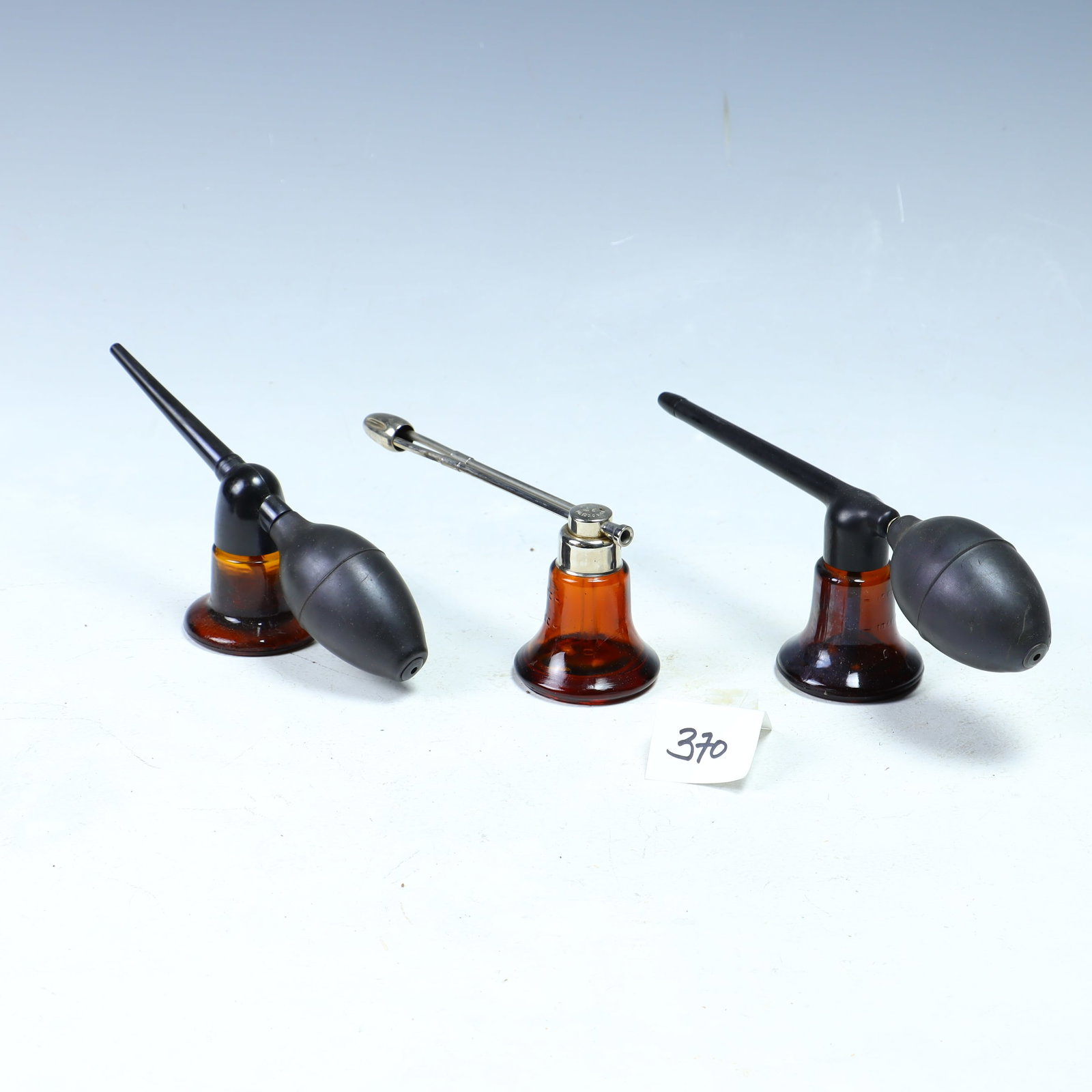 Three antique amber glass atomizers (1 of 1)