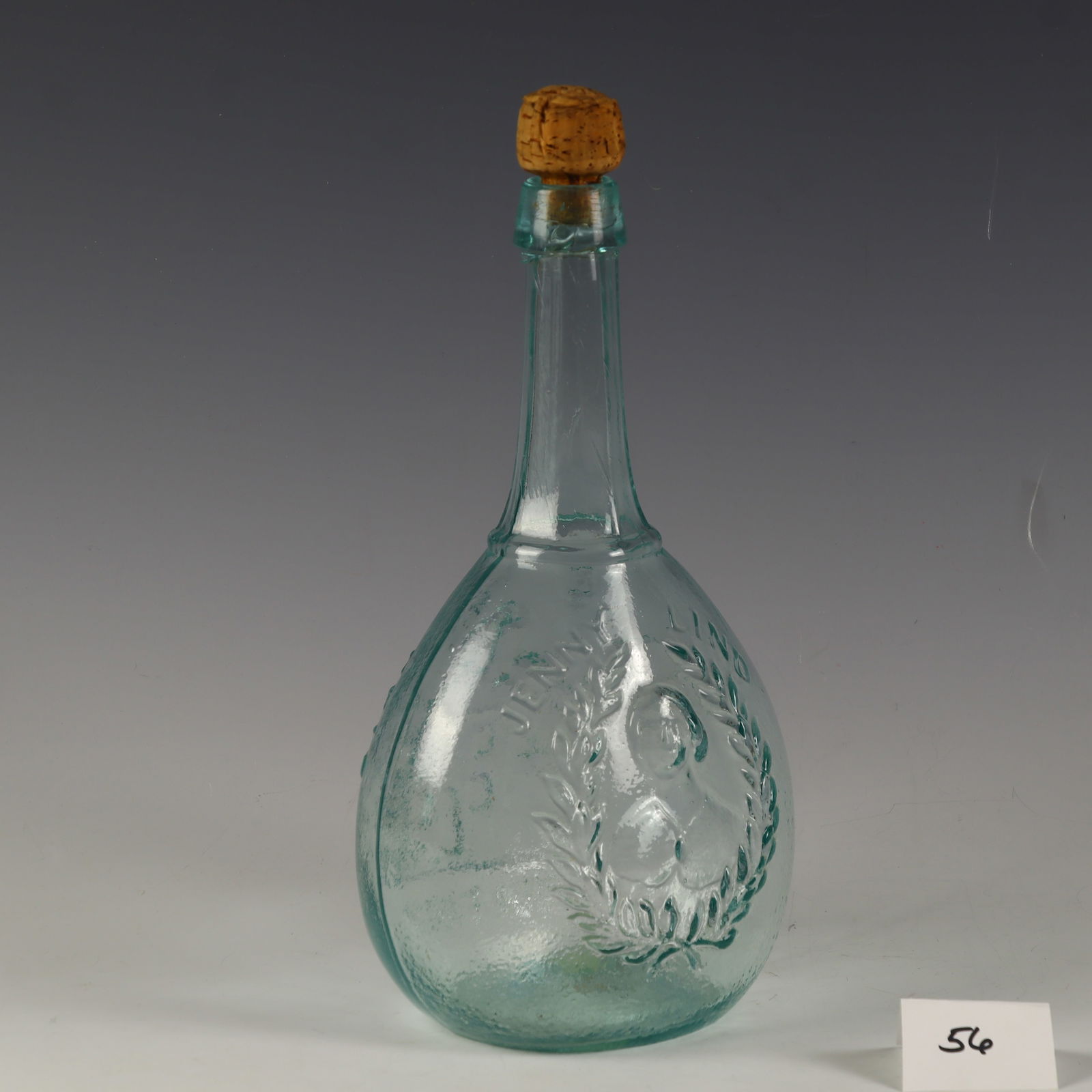 Antique Glass Works S. Huffsey Jenny Lind hand blown blue bottle: Antique Glass Works S. Huffsey Jenny Lind hand blown blue bottle 10 inches tall, 6 inches wide