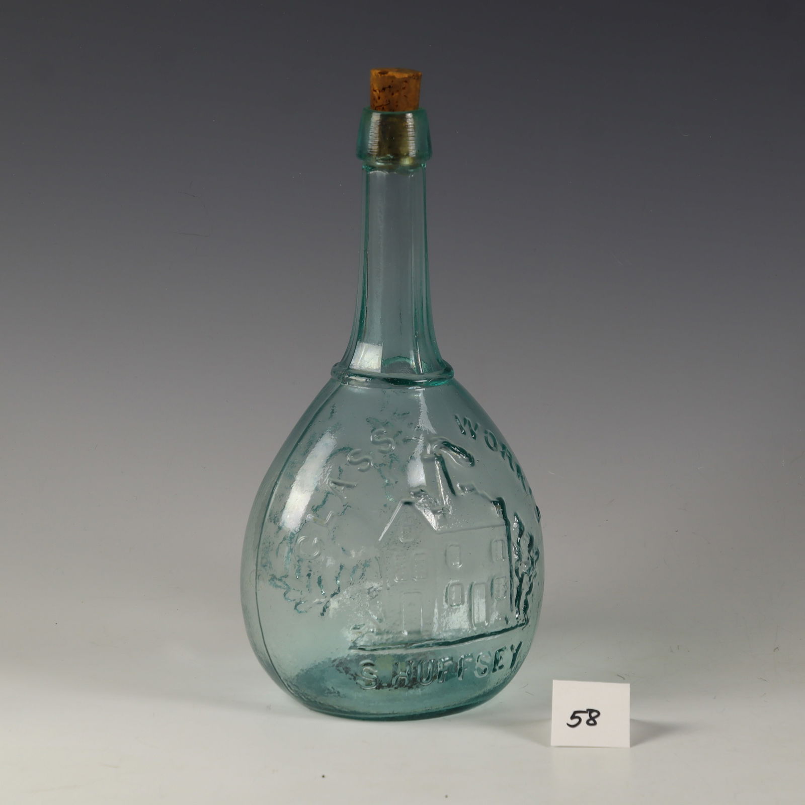 Antique Glass Works S. Huffsey Jenny Lind hand blown blue bottle: Antique Glass Works S. Huffsey Jenny Lind hand blown blue bottle 10.5 inches tall, 6 inches wide