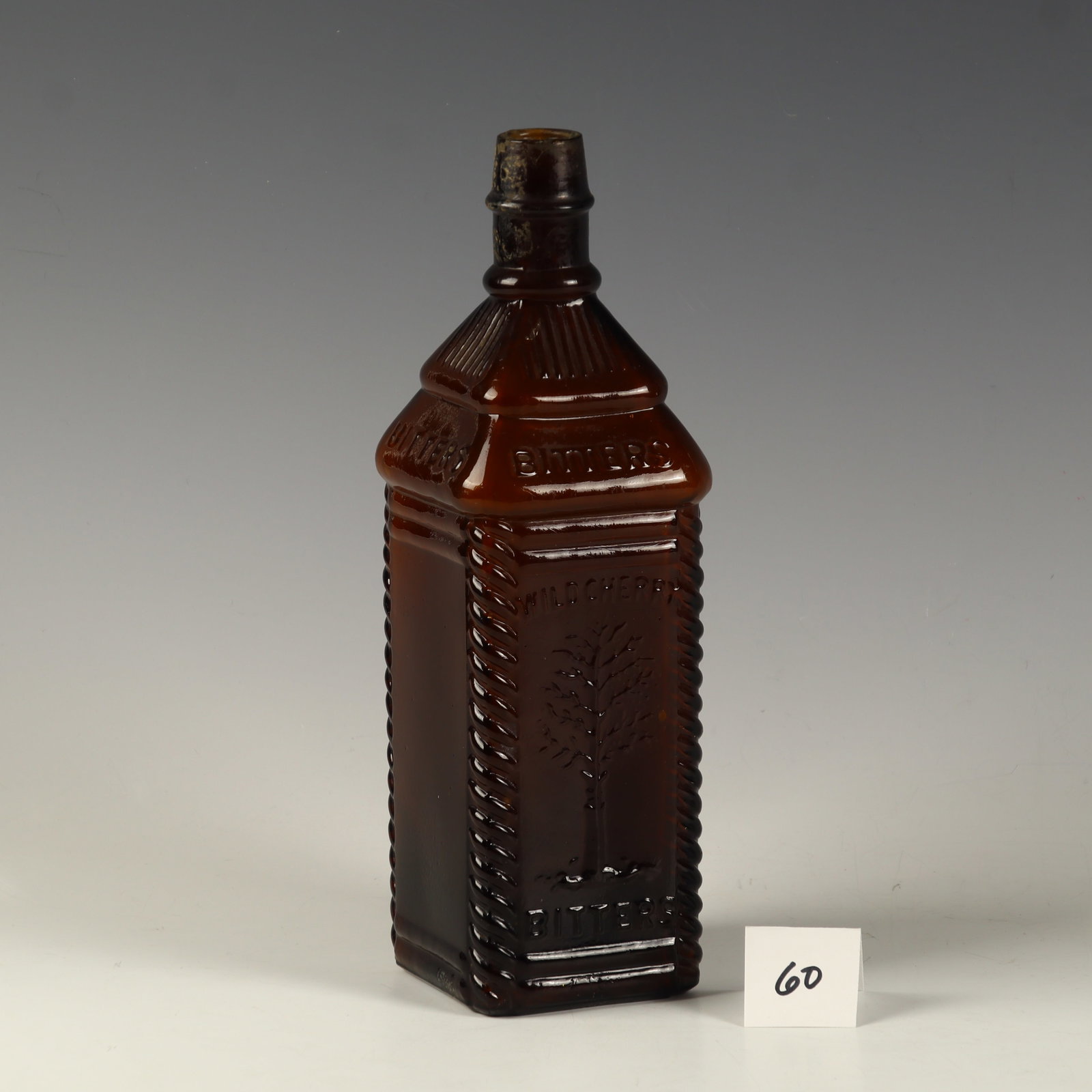 Antique Bitters Amber Bottle and H. Pherb Wild Cherry Bitters Reading, Pa 1870-1880: Antique Bitters Amber Bottle and H. Pherb Wild Cherry Bitters Reading, Pa 1870-1880, 10 inches tall, 3 inches square baseSee a video preview of this lot on YouTube at:https://www.youtube.com/watch?v=y