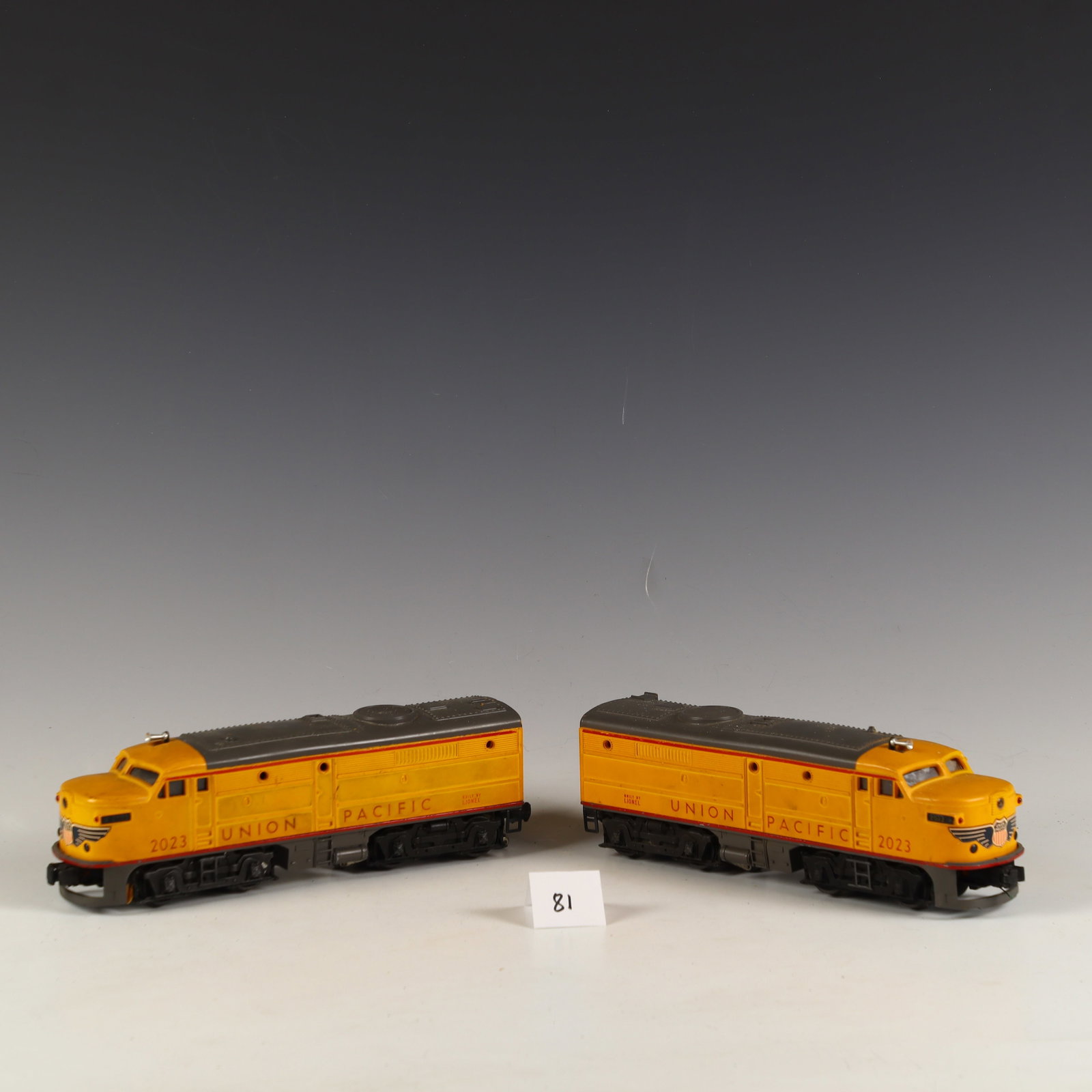 Lot of Two Vintage Lionel 2023 Diesel Locomotives: Lot of Two vintage Lionel 2023 Diesel Locomotives, Lionel New York, one is complete and together as the drive unit, the other one is the passive follow unit is complete but missing a small bolt or scr